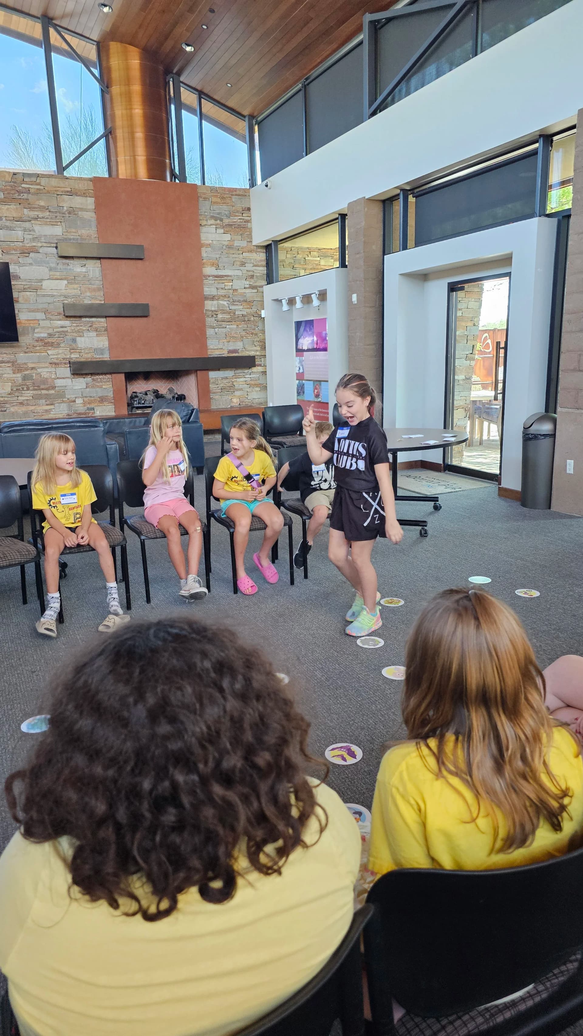A CIP coach working alongside students