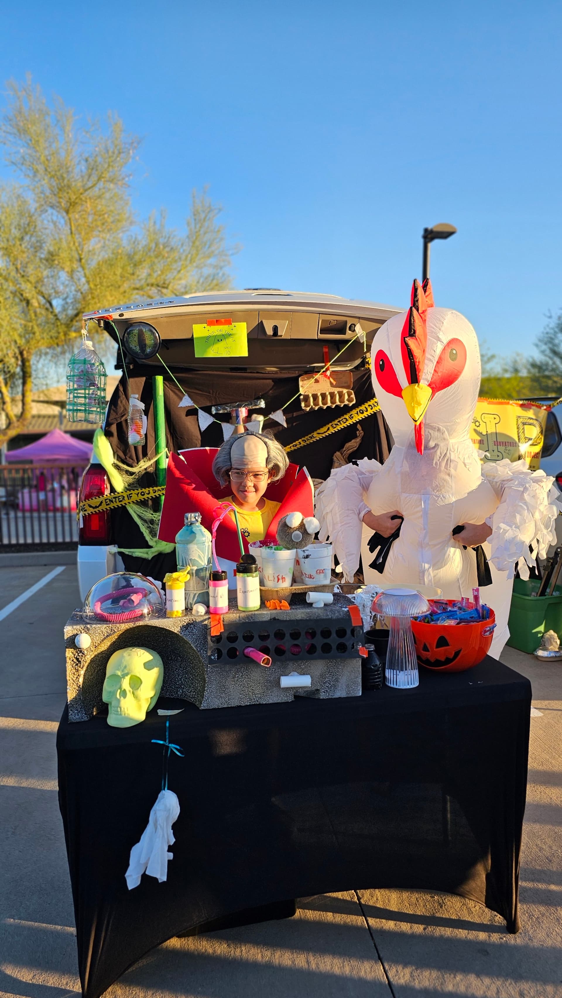 CIP booth at a community trunk-or-treat event