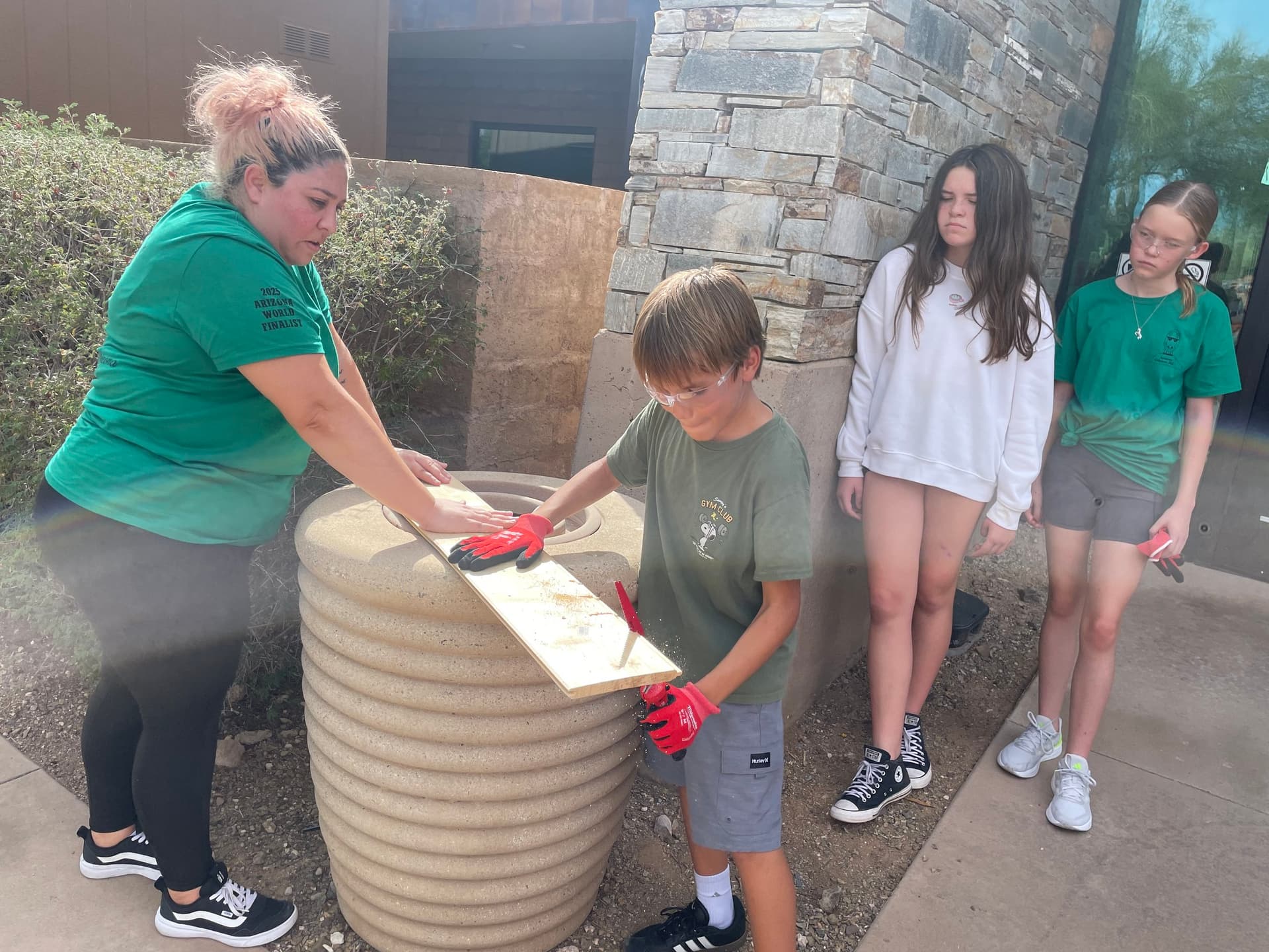 Students building outdoors at CIP